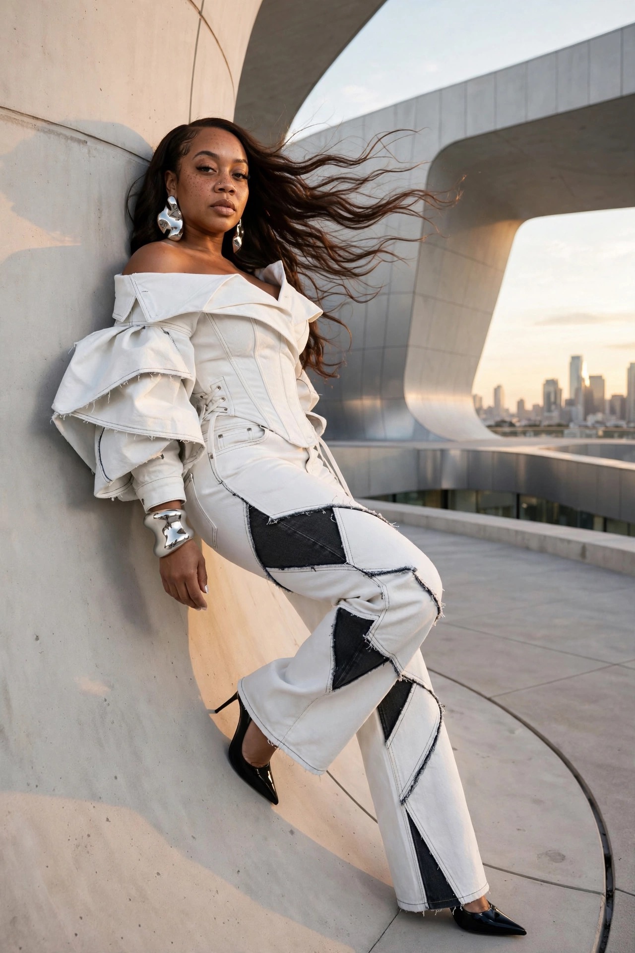 Coach Lisa in a white editorial look at sunset